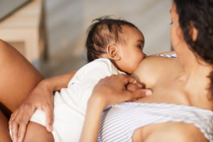 Attaching baby at breast